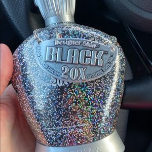 Designer skin tanning lotion